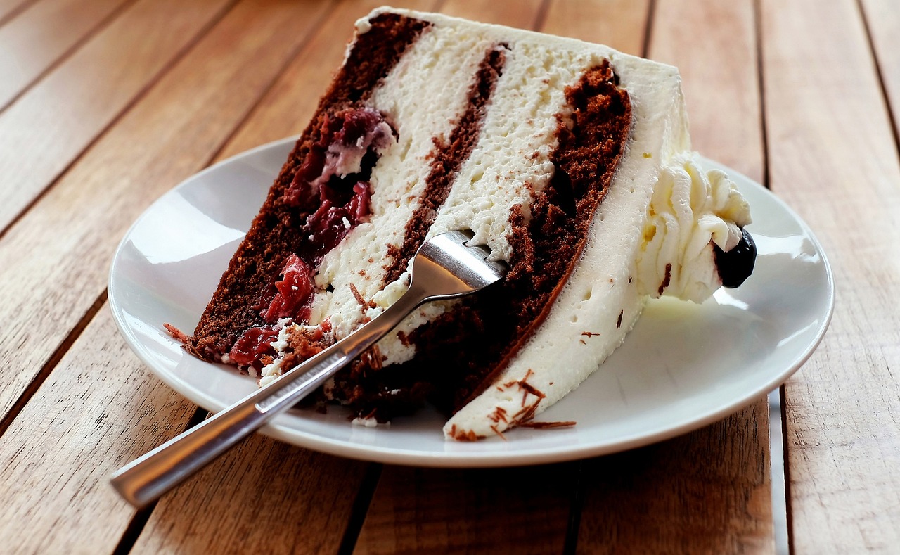 Slices of layered cream cake